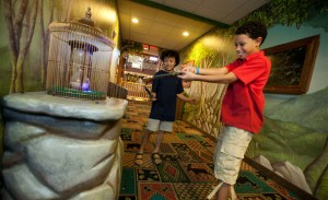 If you have ever visited a Great Wolf Lodge, you likely know that all of these strange occurrences are part of MagiQuest, an interactive game played throughout the resort. I read about MagiQuest before our visit, but I had no idea that the game would be a central part of the Great Wolf experience. The hotel's lobby, common areas, and several floors of the hotel have MagiQuest elements tucked away. It is simply amazing to see how popular this game is with visitors. If you don't have a magic wand in hand, you quickly feel left out.